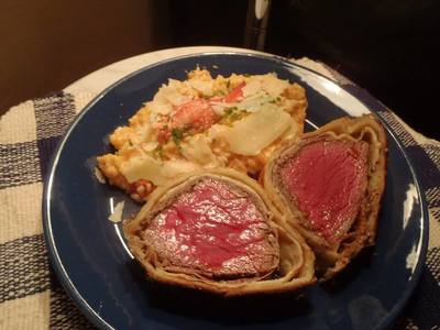 plated beef wellington with lobster risotto, plated