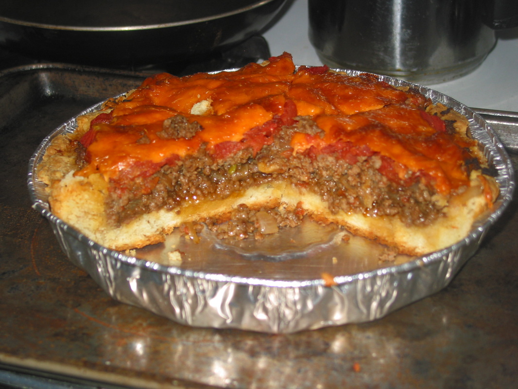 side profile of the cut cheese burger pie Picture