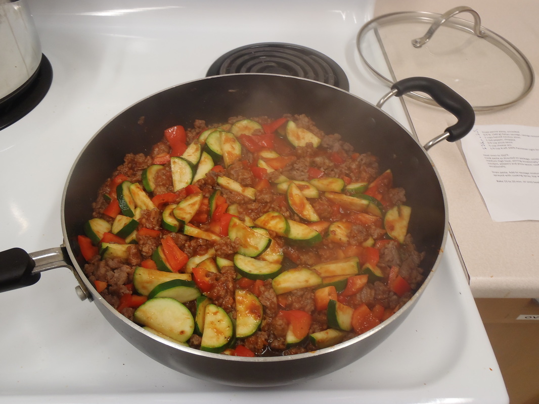Meat and Vegatables in skillet 