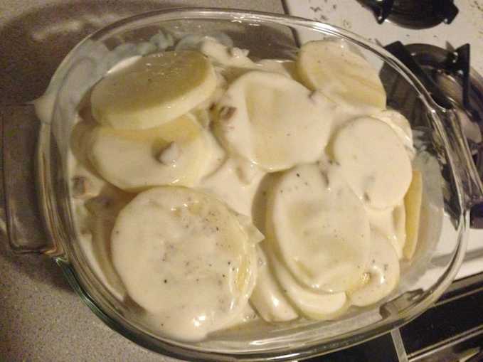 Uncooked fully prepared scalloped potatoes Picture