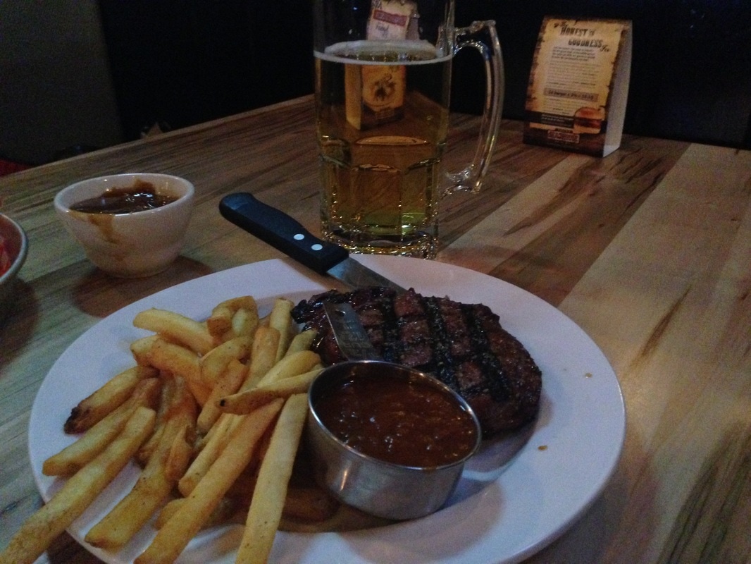 9 oz Ribe Eye Steak with Fries Picture