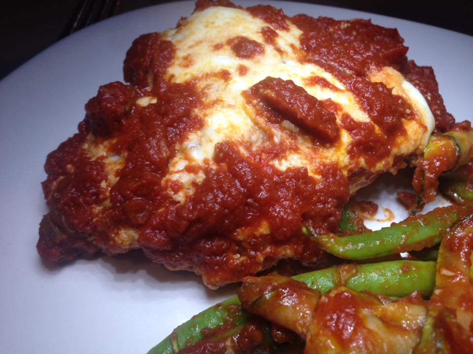 chicken parmesan plated with veg